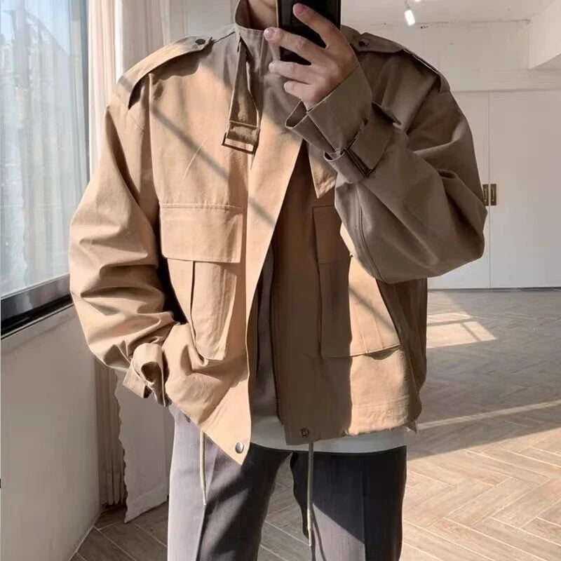 A stylish vintage-inspired jacket with an overalls-inspired design, featuring a lightly mature aesthetic and premium construction.