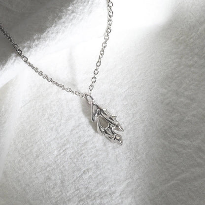 Premium silver Wind and Fire Charm Pendant, a stylish accessory for Kiwi blokes with an adjustable chain and unique charm design