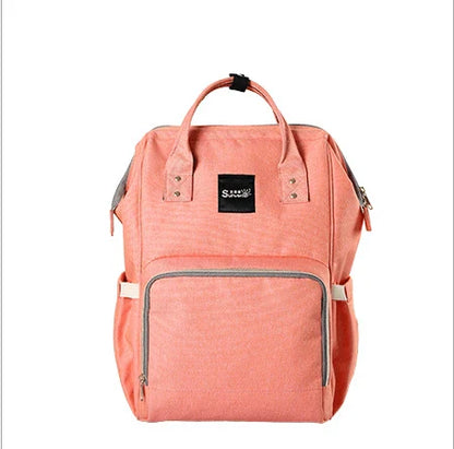 Stylish and practical mummy bag with reinforced handles, durable buckles, and separate bottling area for Kiwi mums