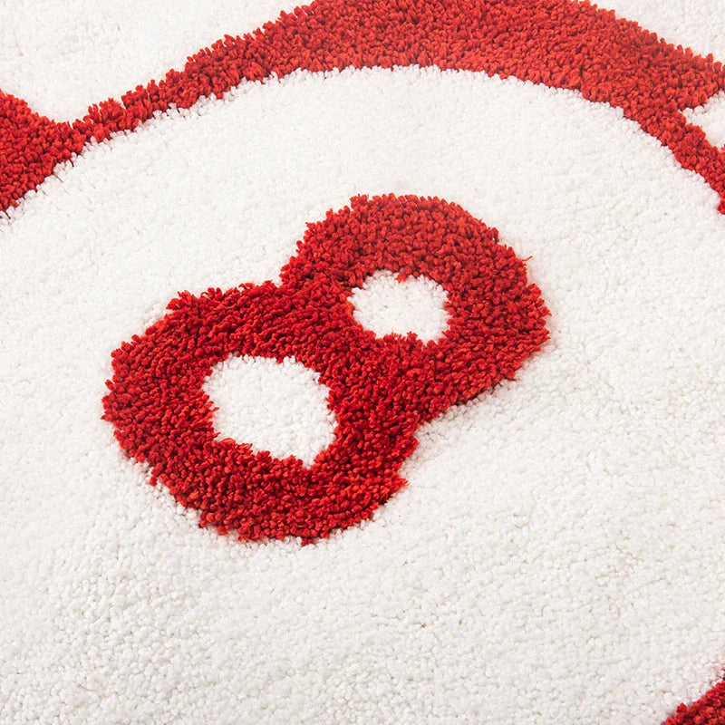 Vibrant 8 ball-inspired tufted area rug in red or black, perfect for adding a playful touch to Kiwi homes