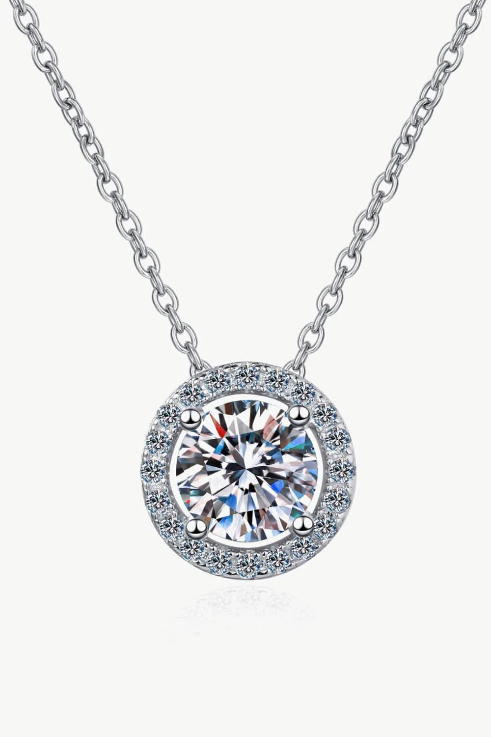 A stunning 1 carat moissanite pendant necklace made with 925 sterling silver and zircon accents, crafted in New Zealand