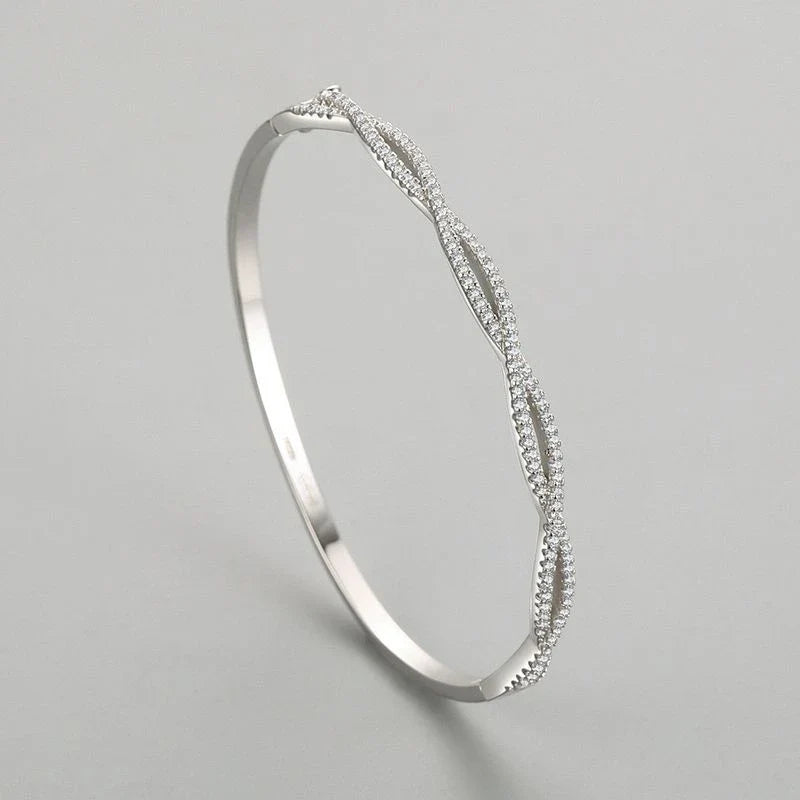 Wave-shaped silver bracelet with adjustable sizes, crafted with premium materials and innovative technology