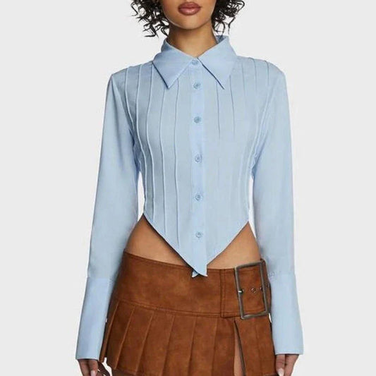 Stylish blue blouse with lace-up back and V-shaped hem, a versatile wardrobe staple with a touch of modern elegance.