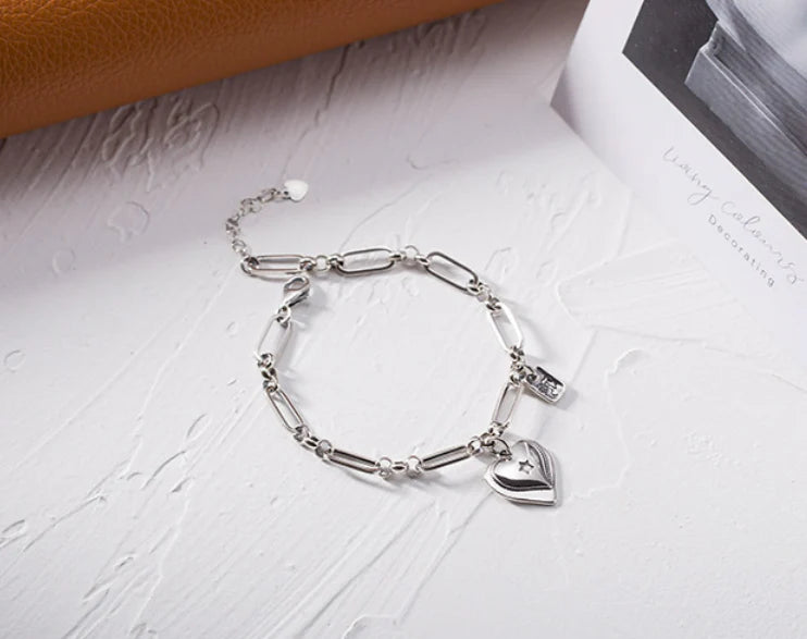 Handcrafted 925 sterling silver bracelet with a delicate heart design, a timeless and elegant accessory for Kiwi women.