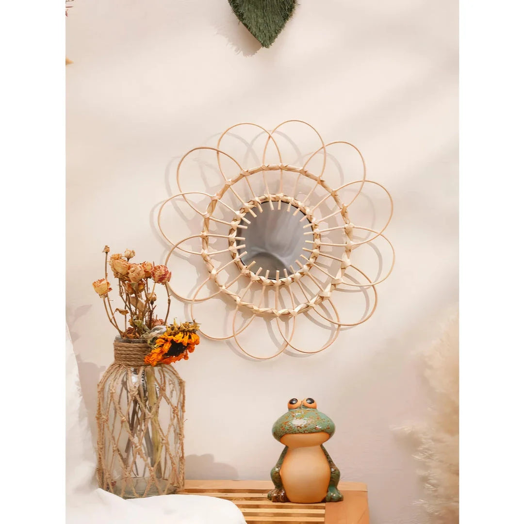 Handmade rattan wall mirror with a flower-shaped design, adding natural elegance to a Kiwi home decor