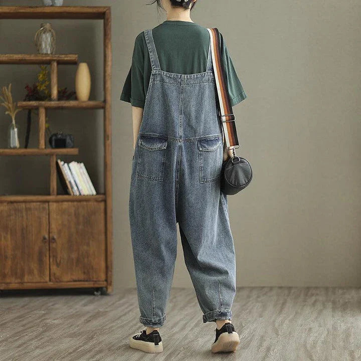 Trendy denim pants with embroidered straps for women, available in light blue color and various sizes from M to XXL