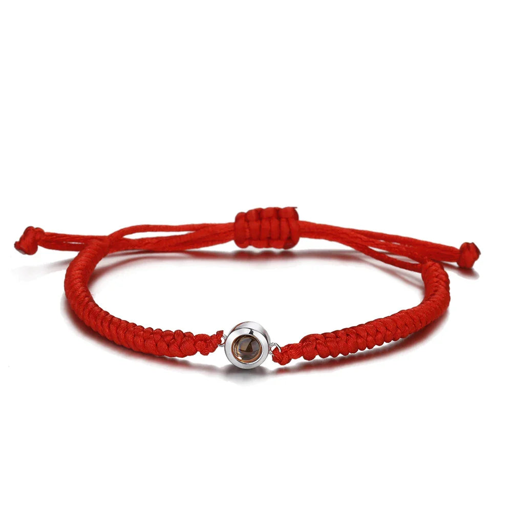 Stylish braided rope accessory in vibrant red, black, and rainbow colors with a premium, Kiwi-inspired design