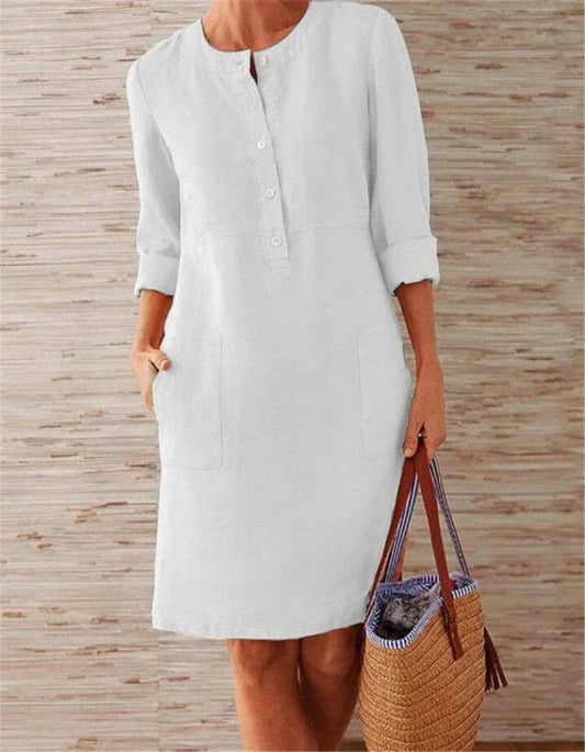 Vintage-inspired cotton and linen dress in a straight silhouette with full sleeves and button detailing, perfect for a Kiwi summer