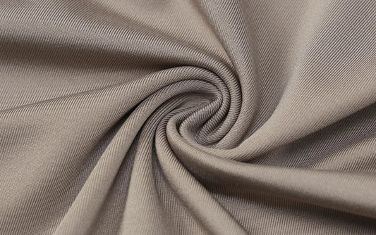 A stylish one-shoulder top and drawstring skirt set made from premium milk silk fabric, perfect for elevating your casual wardrobe.