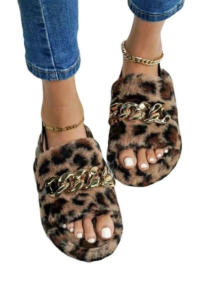 Leopard print plush slippers with metal chain accent, offering breathable comfort and stylish ethnic-inspired design.