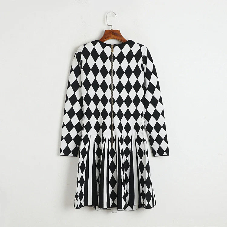 Black and white diamond plaid knitted dress with a stylish lion buckle detail