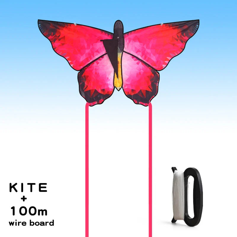 Vibrant red and blue butterfly kite soaring through the skies over New Zealand's scenic landscapes