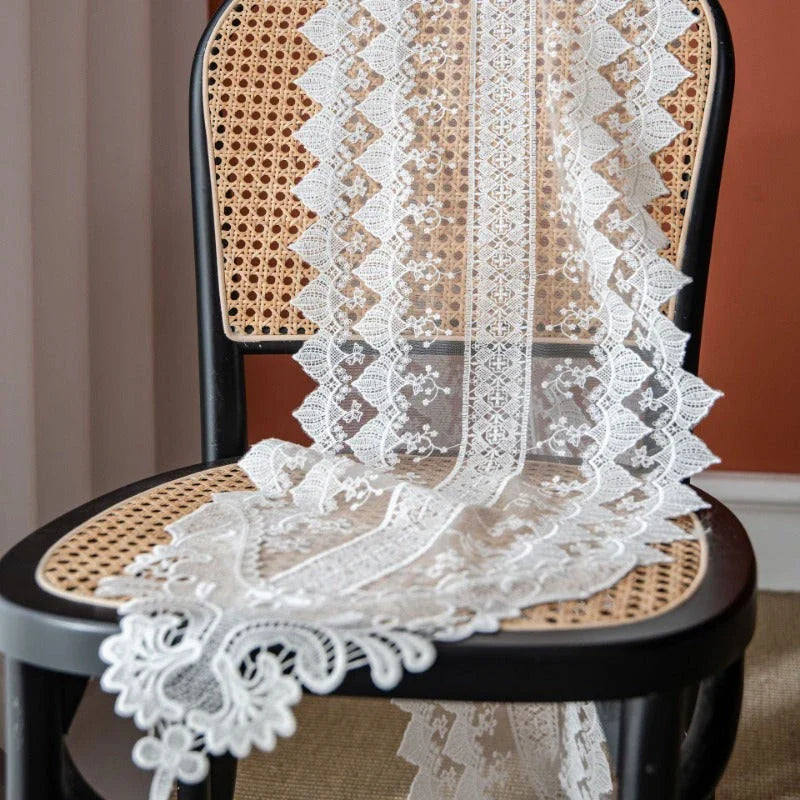 Elegant Lace Table Runner with intricate embroidery and hollowed-out design, perfect for enhancing the look of any dining table in New Zealand.