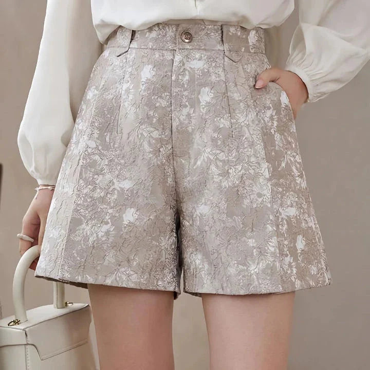 Elegant floral jacquard a-line shorts with metal buttons in apricot color