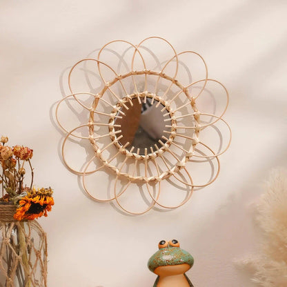 Handmade rattan wall mirror with a flower-shaped design, adding natural elegance to a Kiwi home decor