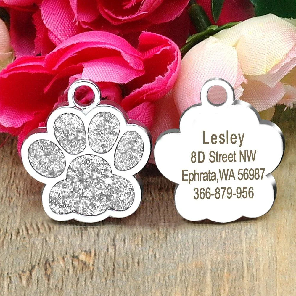 Cute paw-shaped pet tag with rhinestones, designed for Kiwi pets to provide stylish identification and anti-lost protection.