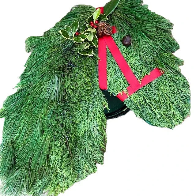 Rustic double horse head Christmas wreath with lifelike pine branches, a unique and charming Kiwi-inspired holiday decoration