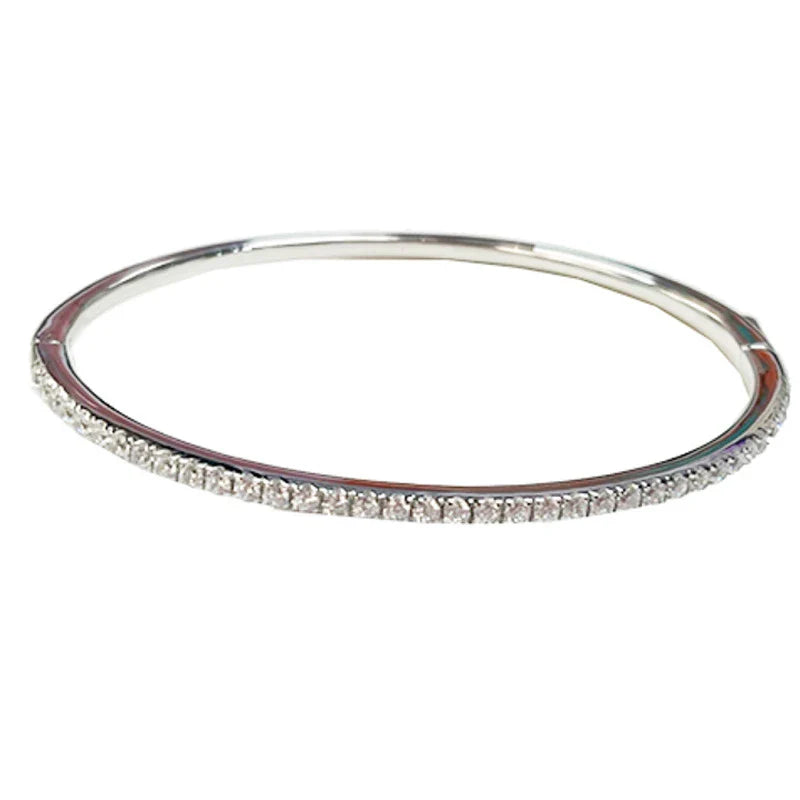 A beautiful 925 sterling silver bracelet with a fine row of sparkling diamonds, perfect for the fashion-forward Kiwi woman.