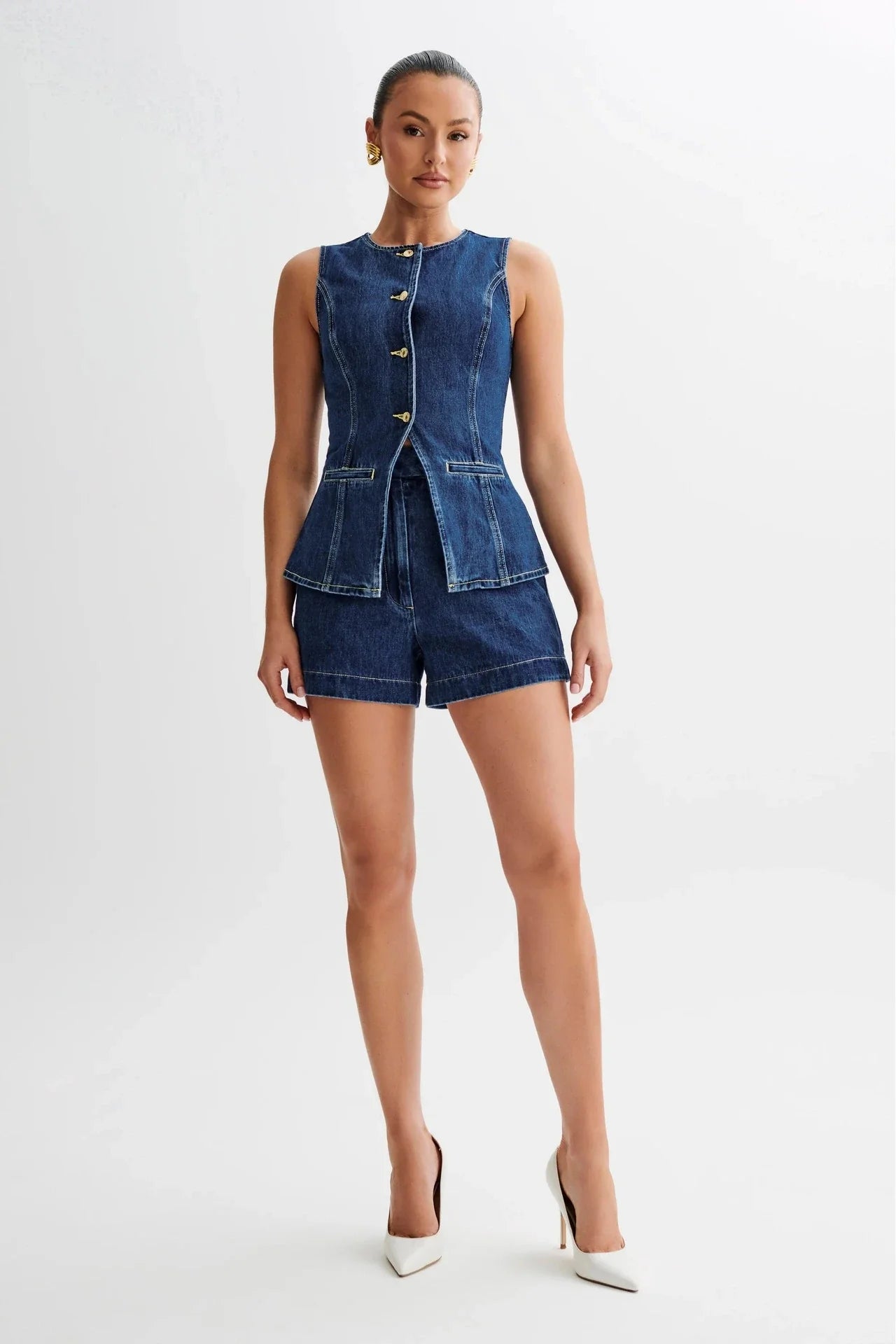 Stylish denim vest and high-waisted shorts set in a contemporary Kiwi-inspired design, perfect for summer fashion