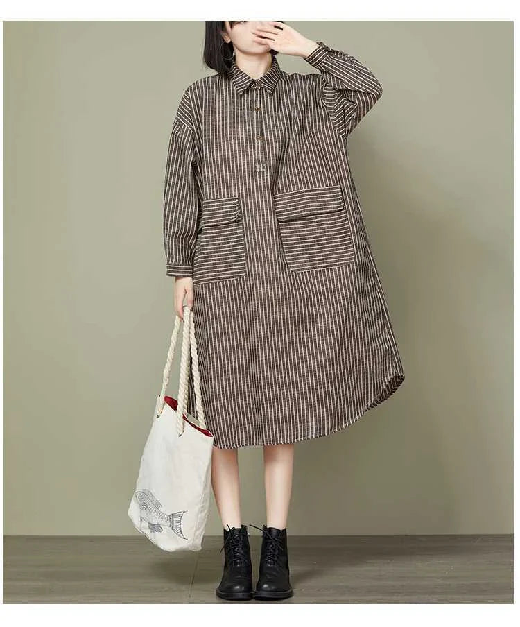 Plus-size women's dress with striped pattern, asymmetric skirt, and long sleeves