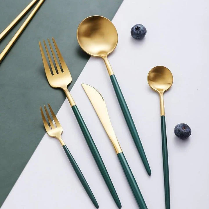 A set of eco-friendly, minimalist tableware in green and gold colors, suitable for 4 diners in a New Zealand home.