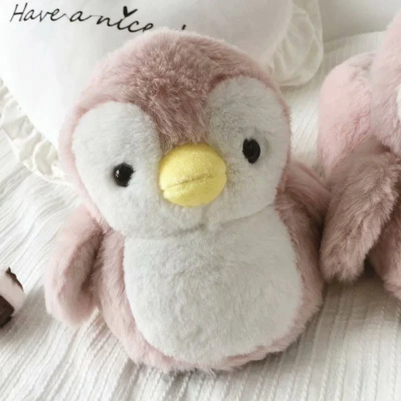 Trendy Penguin Plush Slippers with cozy plush material and non-slip soles for indoor comfort