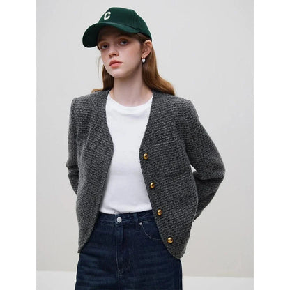 Warm and stylish women's winter jacket made of wool tweed fabric with a chic solid pattern and V-neck collar design