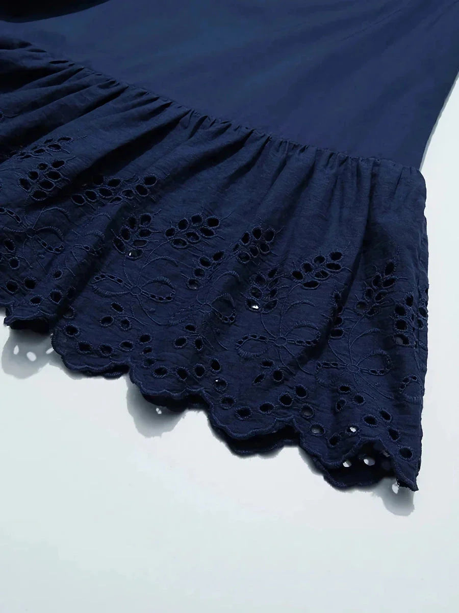 Elegant blue high-waisted A-line summer skirt with intricate lace patchwork details