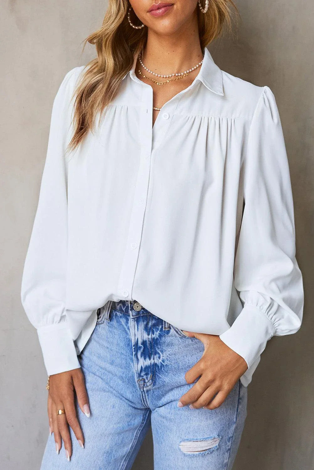 Gathered Detail Puff Sleeve Shirt in blue, featuring a collared neckline, buttoned front, and distinct puff sleeves for a timeless Kiwi style.