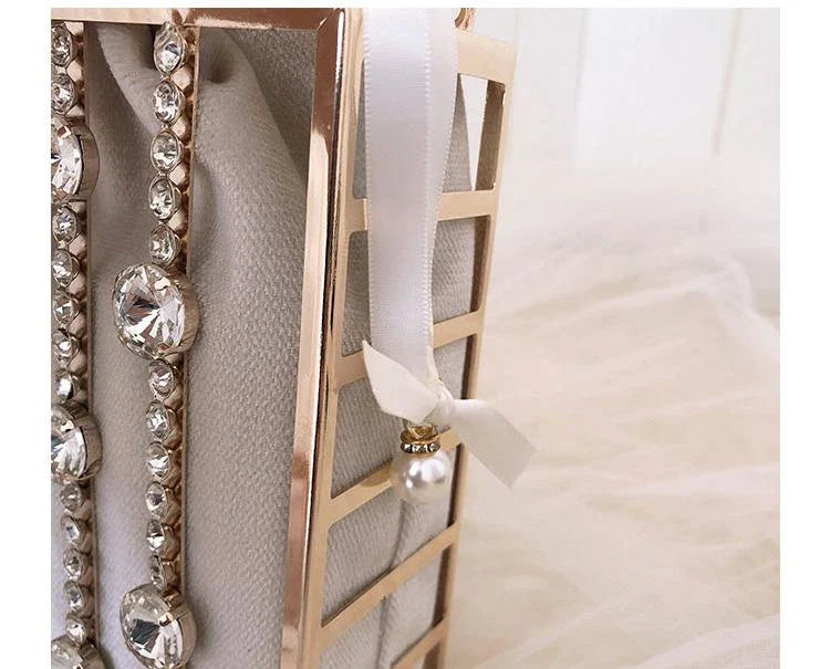 A stylish Kiwi-designed diamond-studded dinner bag with metallic accents, showcasing a range of premium features like lace, plaid, and sequins.