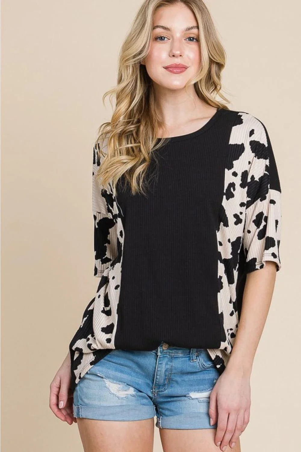 Stylish cow-print tee with ribbed fabric for Kiwi ladies, perfect for casual outings or night out with friends