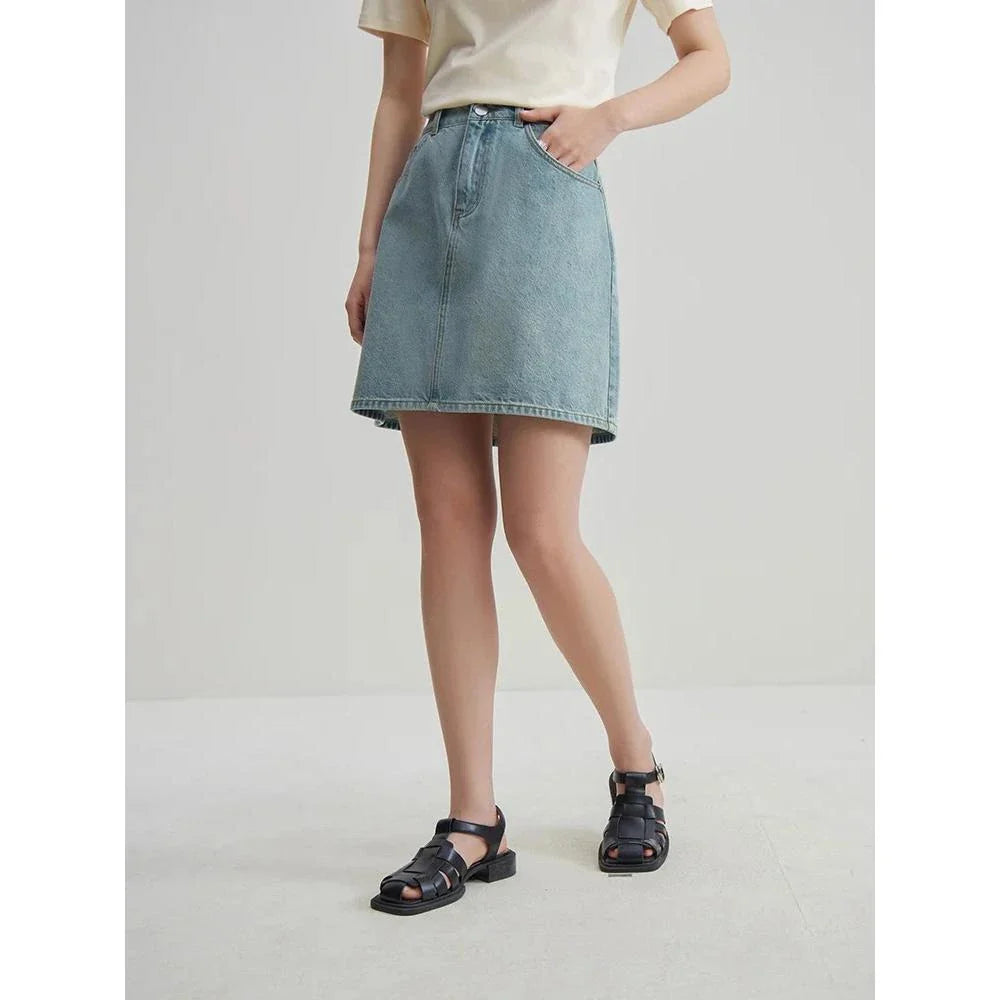 Chic high-waisted denim skirt with a flattering A-line silhouette, perfect for Kiwi summer days