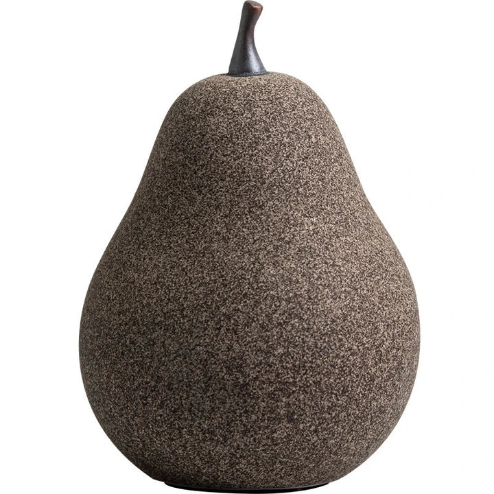 Handcrafted ceramic pear decoration with a sleek, modern design, perfect for adding a touch of natural elegance to any Kiwi home