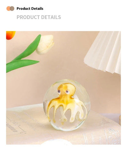 Handcrafted glass octopus windshield washer fluid ornament in ocean blue and tea brown colours, made in New Zealand