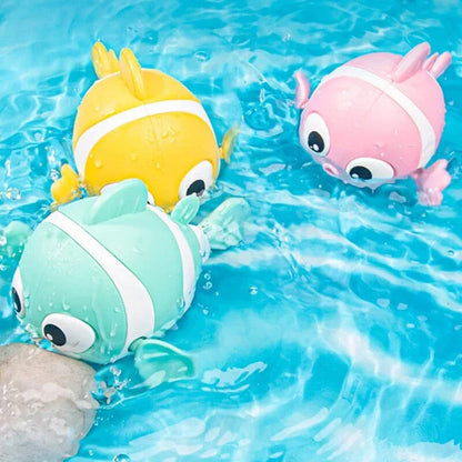 Cartoon fish wind-up bath toy in green, designed for New Zealand toddlers to enjoy during bathtime