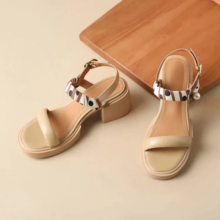 Chic open-toe leather platform sandals with adjustable buckle strap and square heel, perfect for Kiwi summer style.