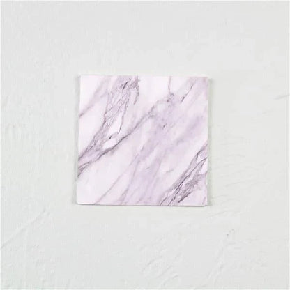 Stylish and practical marble-inspired silicone coasters for protecting surfaces in New Zealand homes