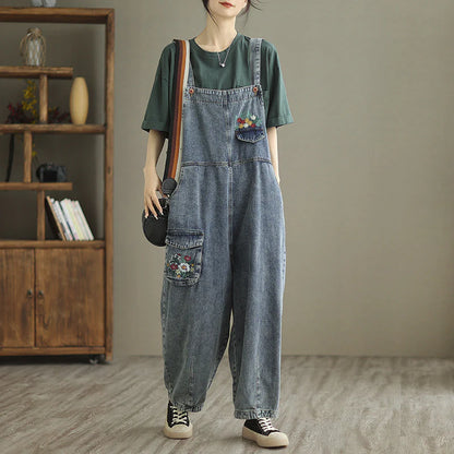 Trendy denim pants with embroidered straps for women, available in light blue color and various sizes from M to XXL