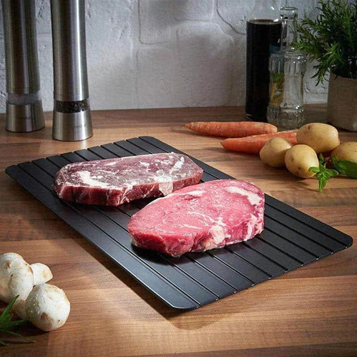 Premium aluminium defrosting tray with fast-acting surface technology to quickly thaw frozen foods for Kiwi kitchens