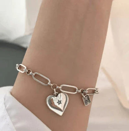 Handcrafted 925 sterling silver bracelet with a delicate heart design, a timeless and elegant accessory for Kiwi women.