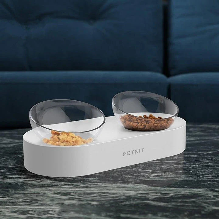 Adjustable pet feeding bowl in white, with rubber feet and height-adjustable design for dogs and cats of all sizes