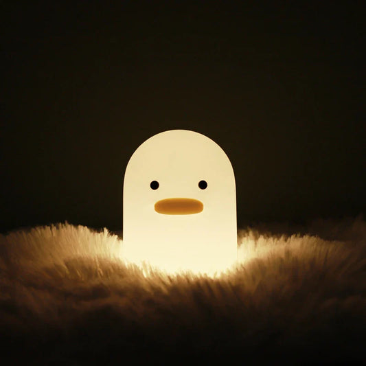 Enchanting Dull Duck LED Night Light with soft silicone body and customizable dimmable lights, perfect for bedrooms and kids' rooms