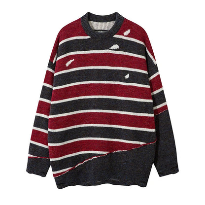 A vibrant red pullover sweater with an eye-catching patchwork stripe pattern, a cozy and stylish Kiwi wardrobe essential.