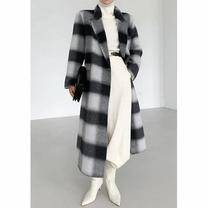 A stylish plaid double-breasted long wool coat for fashionable Kiwi women, featuring a cozy and elegant design with functional pockets and a versatile turn-down collar.