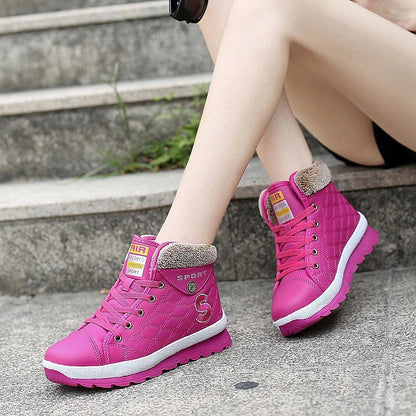 Leather High-waist Velvet Warm Flat-bottomed Middle School Short Boots in stylish white color with cross-strap detailing