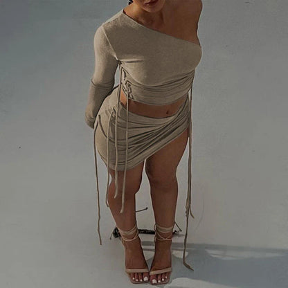 A stylish one-shoulder top and drawstring skirt set made from premium milk silk fabric, perfect for elevating your casual wardrobe.