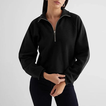 A cosy, gray fleece zip-up hoodie with a stylish turn-down collar, perfect for Kiwi autumn weather.