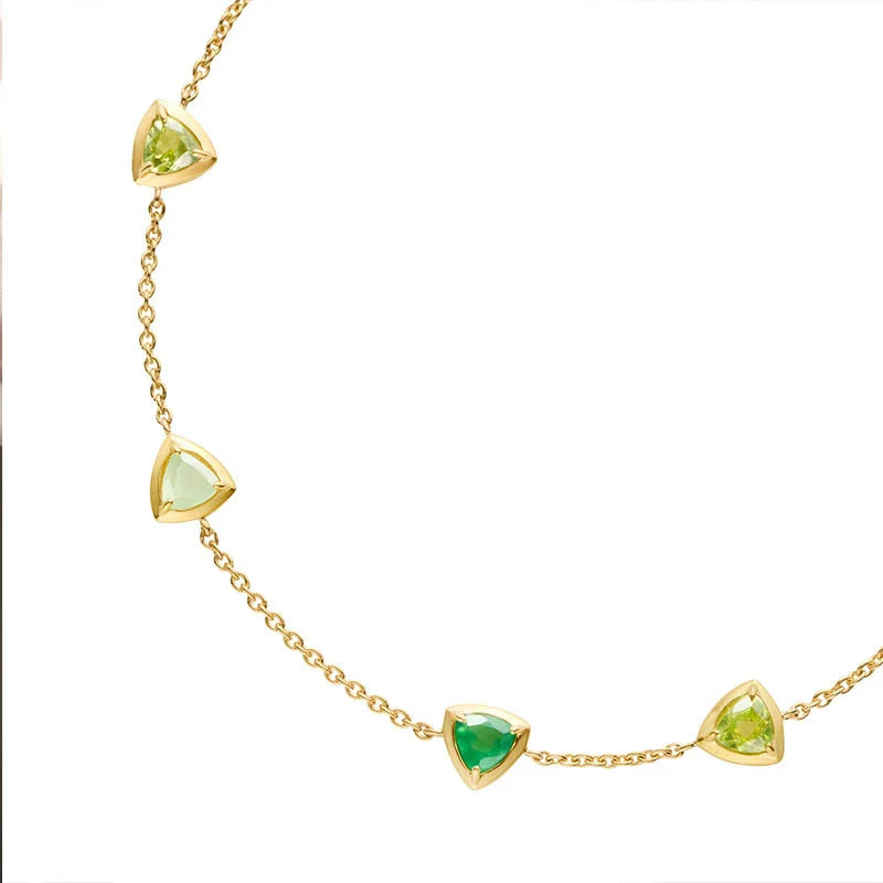 A beautiful, eco-friendly bracelet featuring natural green gems in a modern geometric design