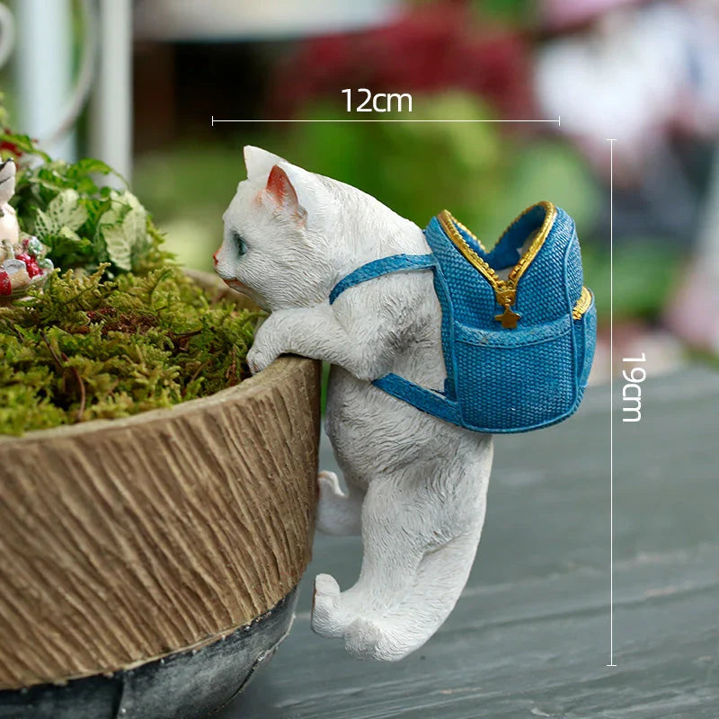 Charming cat backpack-shaped garden ornament made of weather-resistant resin, perfect for adding Kiwiana style and storage to your outdoor space