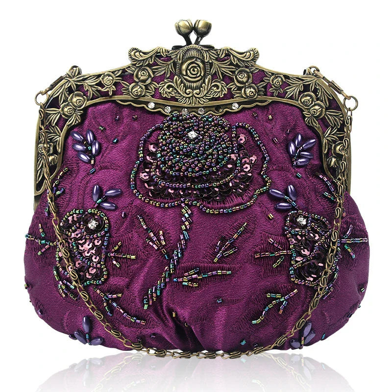 Bead embroidered fashion bag with silk surface, nylon exterior, and magnetic buckle closure
